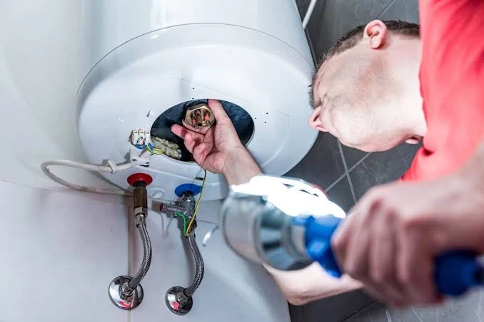 Water heater repaired in a century-old Allison Hill Harrisburg PA brick rowhouse basement