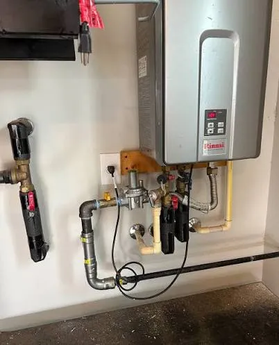 New water heater being installed in a Harrisburg PA home