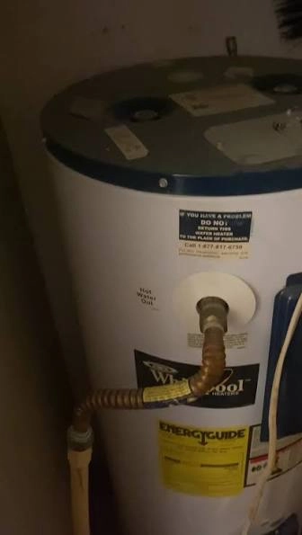 Whirlpool tank water heater with mineral scale on connections in Harrisburg PA
