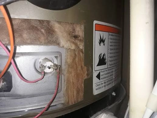 Gas water heater burner chamber with thermocouple wire and lint accumulation in Harrisburg PA