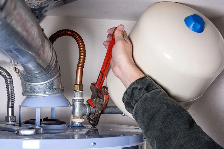 Old water heater being replaced in a Harrisburg PA basement